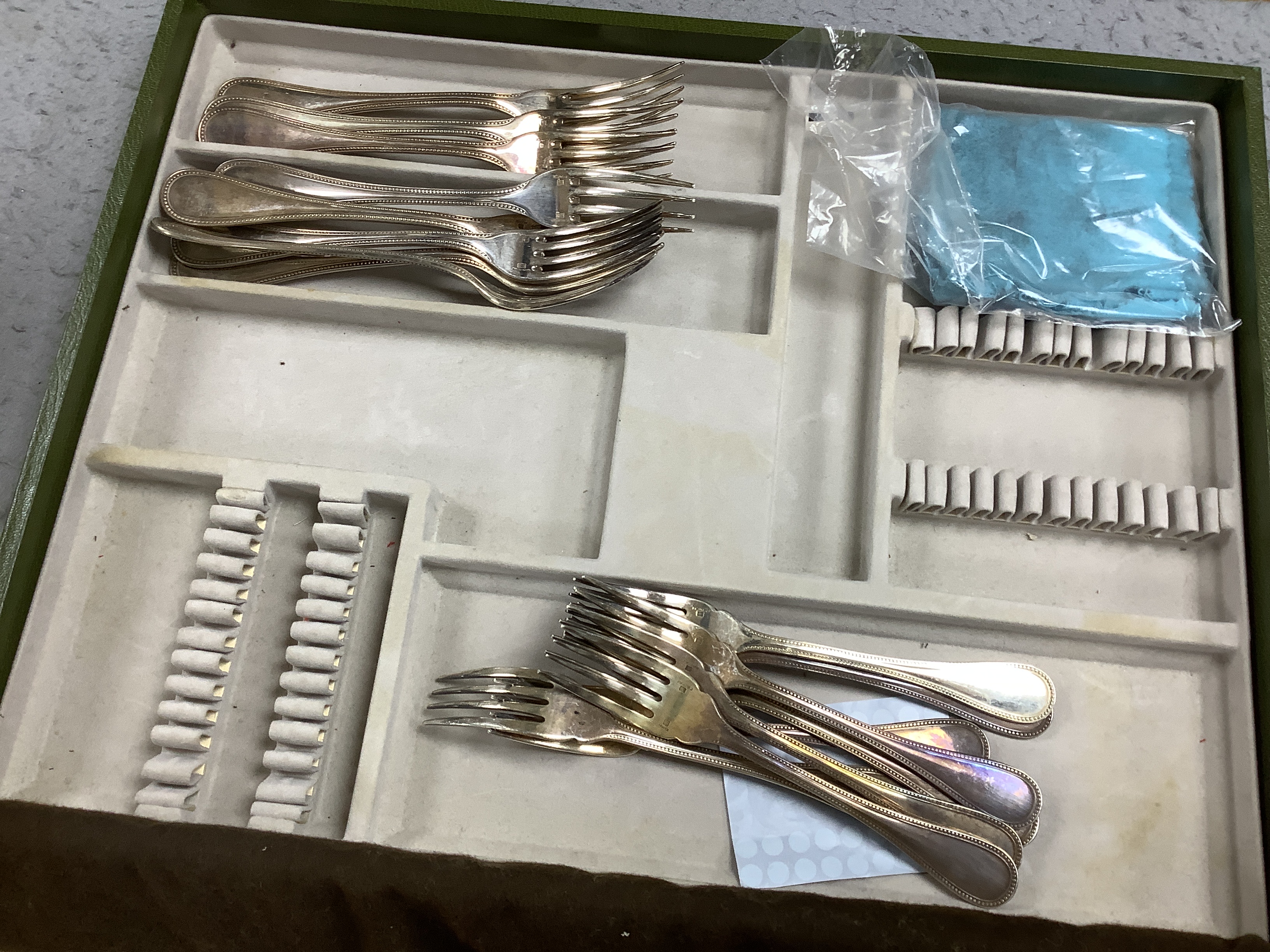 A Christofle suite of cutlery together with other cutlery